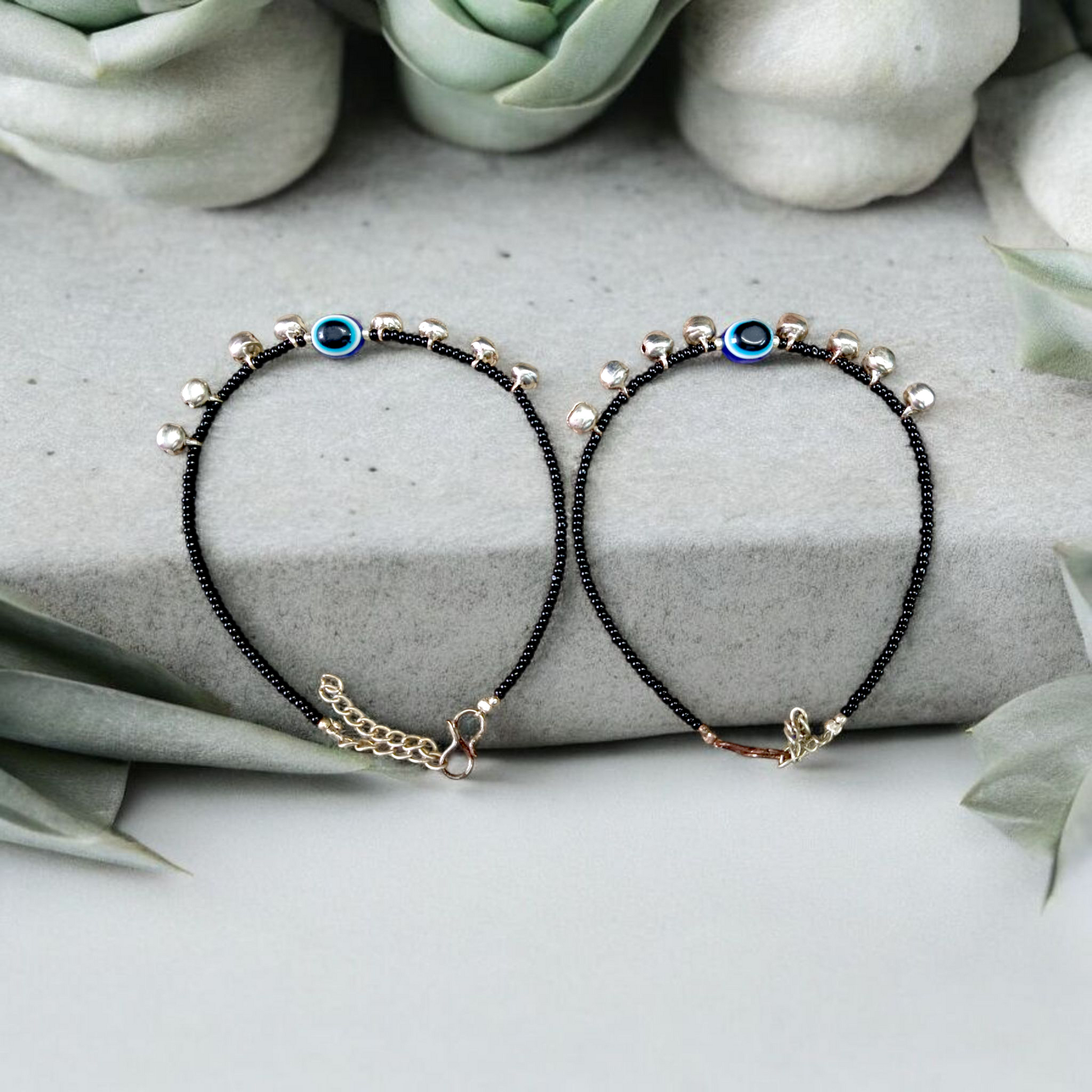 Fancy evil eye anklet for girls with adjustable chain, featuring blue enamel charm and beadwork, ideal for daily wear or special occasions