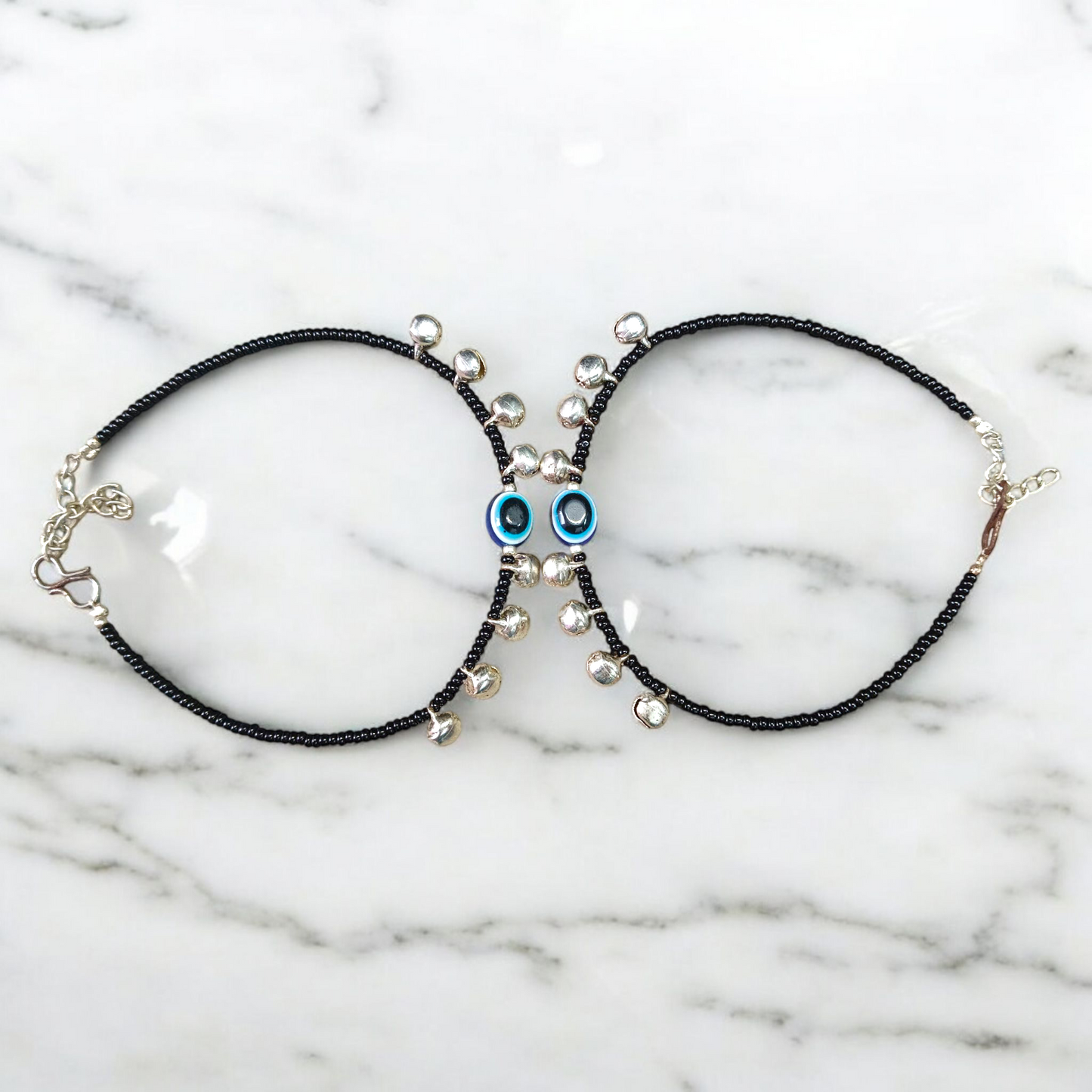Fancy evil eye anklet for girls with adjustable chain, featuring blue enamel charm and beadwork, ideal for daily wear or special occasions