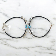 Fancy evil eye anklet for girls with adjustable chain, featuring blue enamel charm and beadwork, ideal for daily wear or special occasions