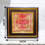 Framed Ganpati Yantra inscribed on natural Bhojpatra, with sacred symbols and wooden casing for display