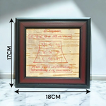 Framed Rahu Yantra hand-drawn on Bhojpatra with red ink, encased in a wooden frame for spiritual use and astrology correction