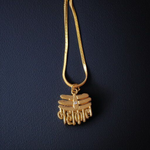 Gold-tone Mahakal locket with chain featuring Lord Shiva engraving, spiritual Hindu jewelry by MALAWALA
