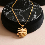 Gold-tone Mahakal locket with chain featuring Lord Shiva engraving, spiritual Hindu jewelry by MALAWALA