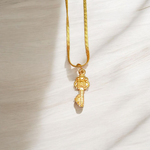 Golden Kuber Kunji locket with matching chain, designed for daily wear and believed to attract wealth and prosperity