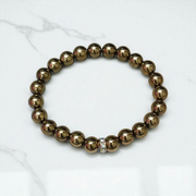 Golden Pyrite Bracelet made with polished 8mm beads, stretchable design for daily wear and spiritual use
