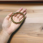 Golden Pyrite Bracelet made with polished 8mm beads, stretchable design for daily wear and spiritual use
