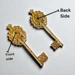 Golden antique-style Kuber Kunji Key with sacred symbols and yantra, used for attracting wealth and financial prosperity at home or office