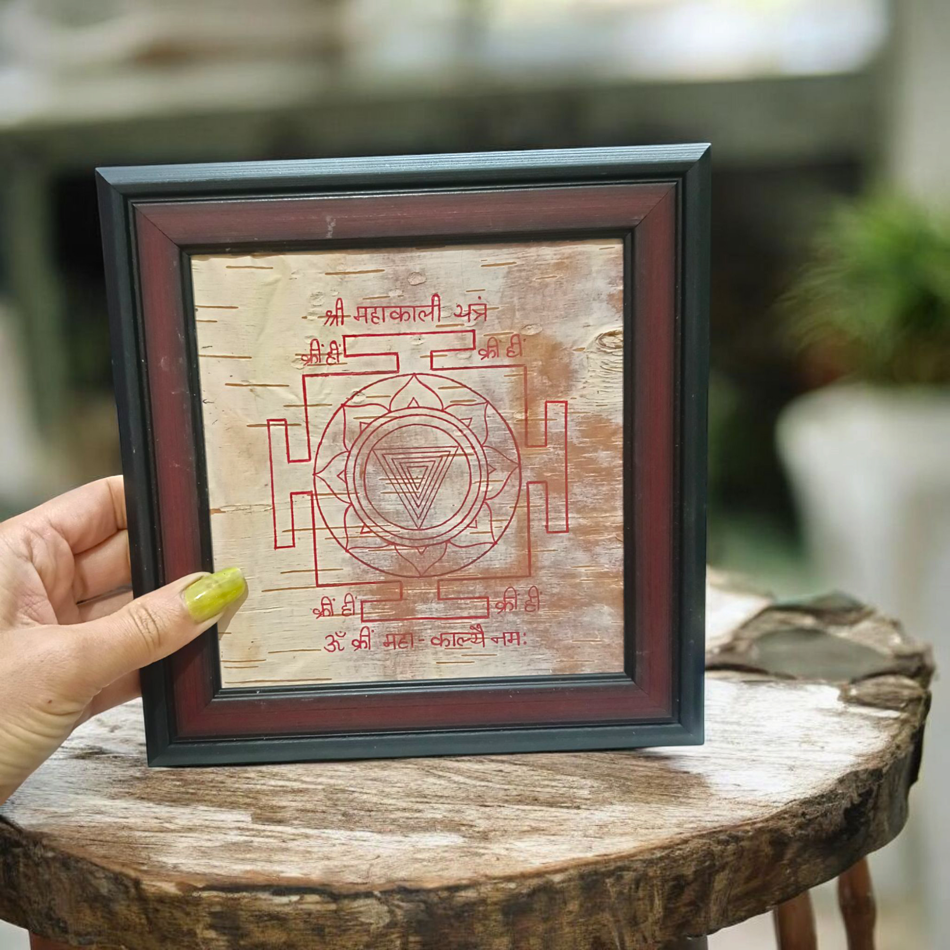Hand-inscribed Mahakali Yantra on Bhojpatra with red ink, enclosed in a wooden frame, ideal for spiritual protection and tantric worship