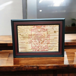 Hand-inscribed Mahakali Yantra on Bhojpatra with red ink, enclosed in a wooden frame, ideal for spiritual protection and tantric worship