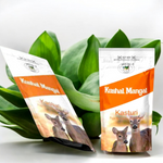 Hand-rolled Kasturi incense sticks with traditional Indian packaging placed beside a lit diya and fresh marigold flowers