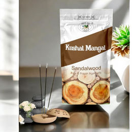 Hand-rolled Sandalwood incense sticks with traditional packaging, placed next to a bronze incense holder and decorative flowers