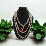 Handcrafted Kamal Gutta Mala made from natural lotus seed beads, available in 27+1 and 108+1 bead variants with a spiritual guru bead and certificate