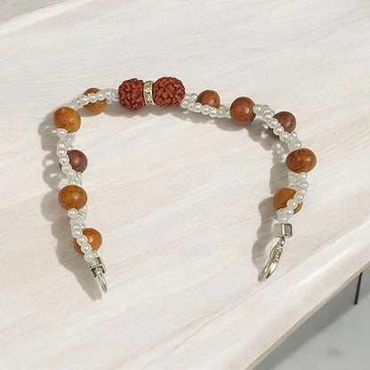Handcrafted Natural Rudraksha & White Sandalwood Bracelet with 8mm beads on elastic thread, designed for spiritual wellness
