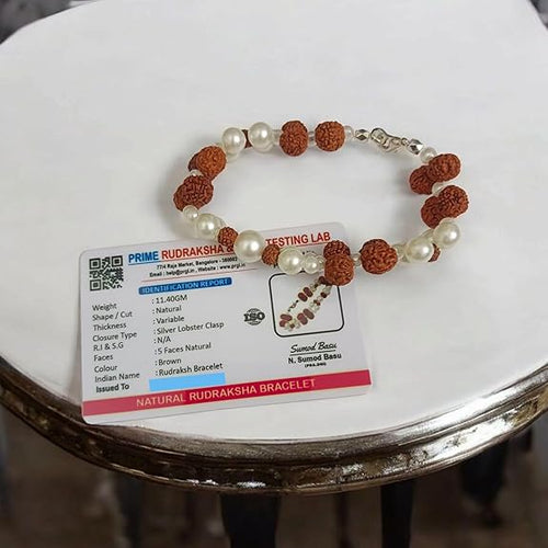 Handcrafted Natural Rudraksha and Pearl Bracelet with adjustable elastic design by Malawala