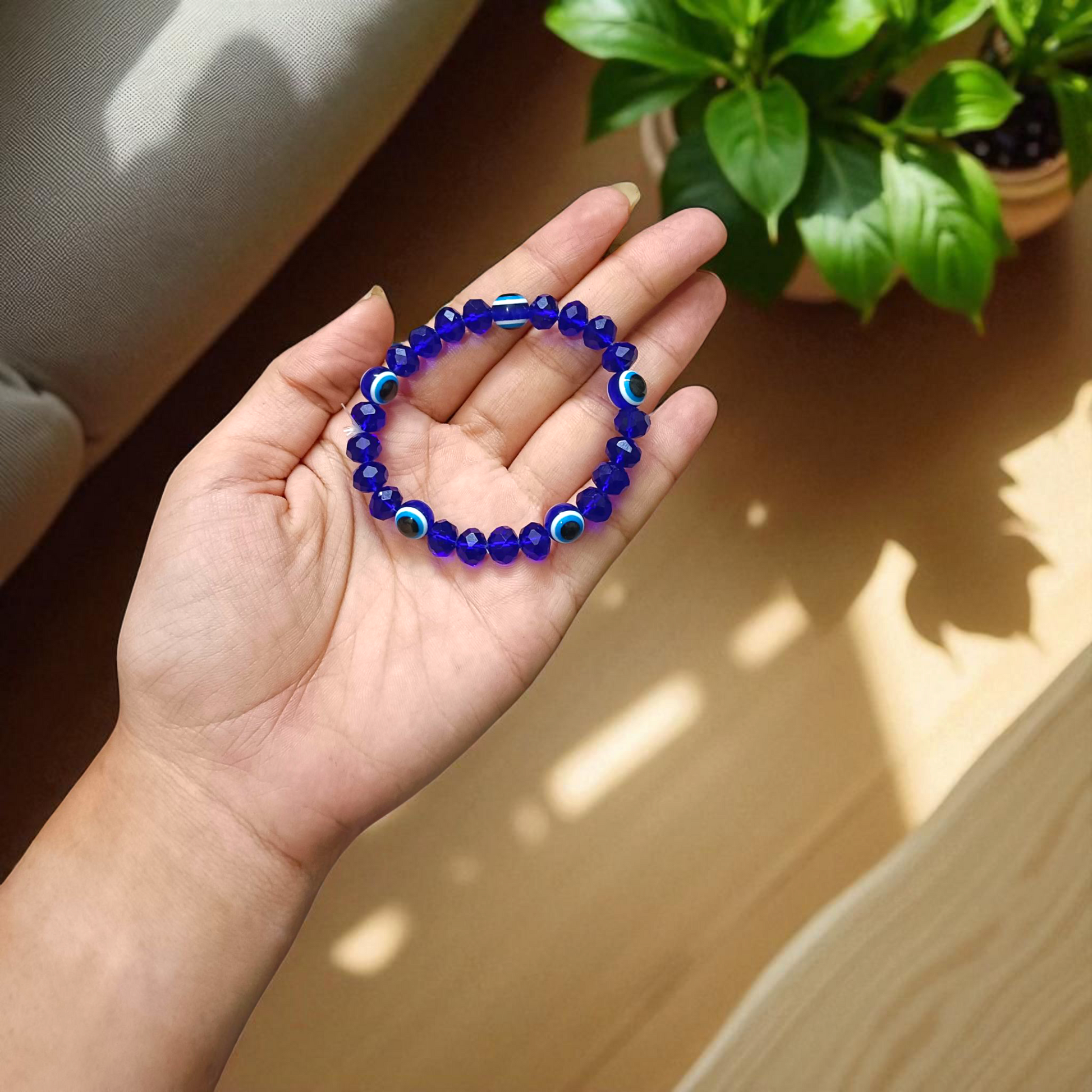 Handcrafted Nazar Suraksha Bracelet with blue evil eye charm on adjustable band – MALAWALA