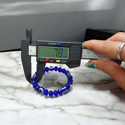 Handcrafted Nazar Suraksha Bracelet with blue evil eye charm on adjustable band – MALAWALA
