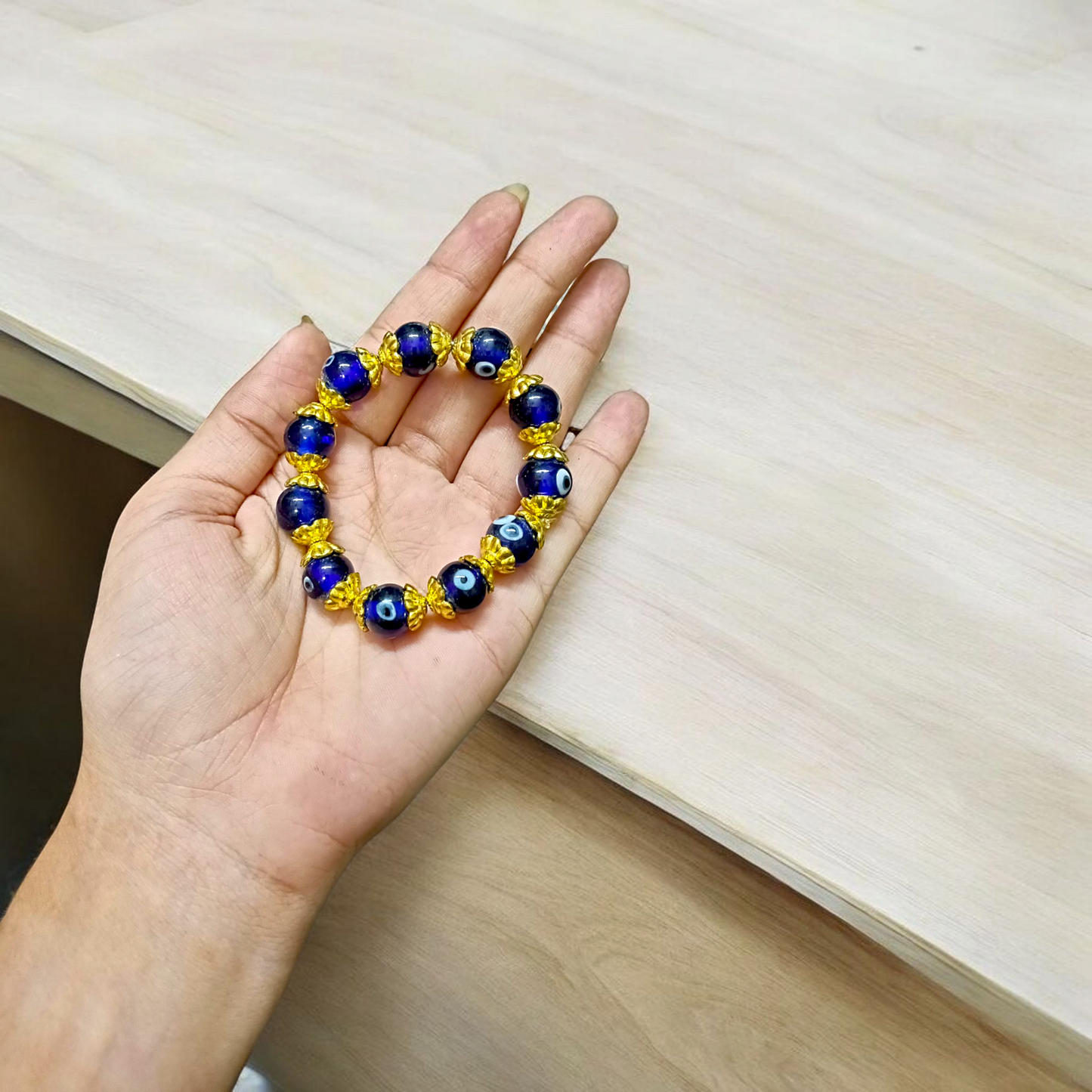 Handcrafted Nazar Suraksha Bracelet with blue evil eye charm on adjustable band – MALAWALA