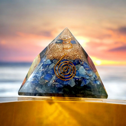Handcrafted Orgone Pyramid made with natural Lapis Lazuli stones, copper spirals, and resin, designed for energy healing and EMF protection