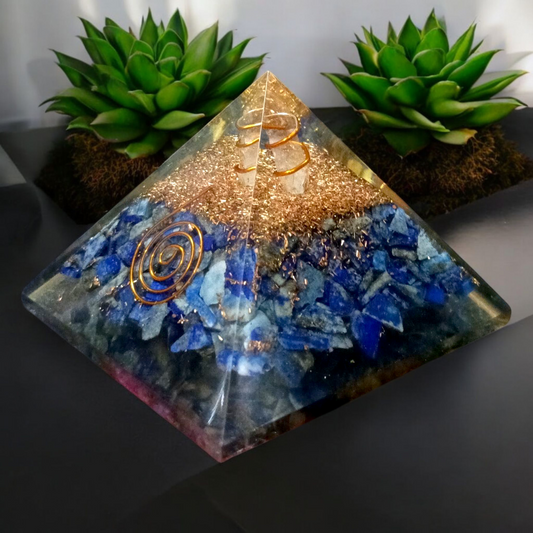 Handcrafted Orgone Pyramid made with natural Lapis Lazuli stones, copper spirals, and resin, designed for energy healing and EMF protection