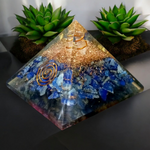 Handcrafted Orgone Pyramid made with natural Lapis Lazuli stones, copper spirals, and resin, designed for energy healing and EMF protection