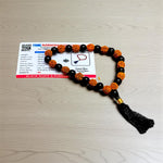 Handcrafted Rudraksha and Black Hakik mala with 5 Mukhi Rudraksha beads, used for protection, grounding, and meditation, available in 27+1 and 108+1 variants