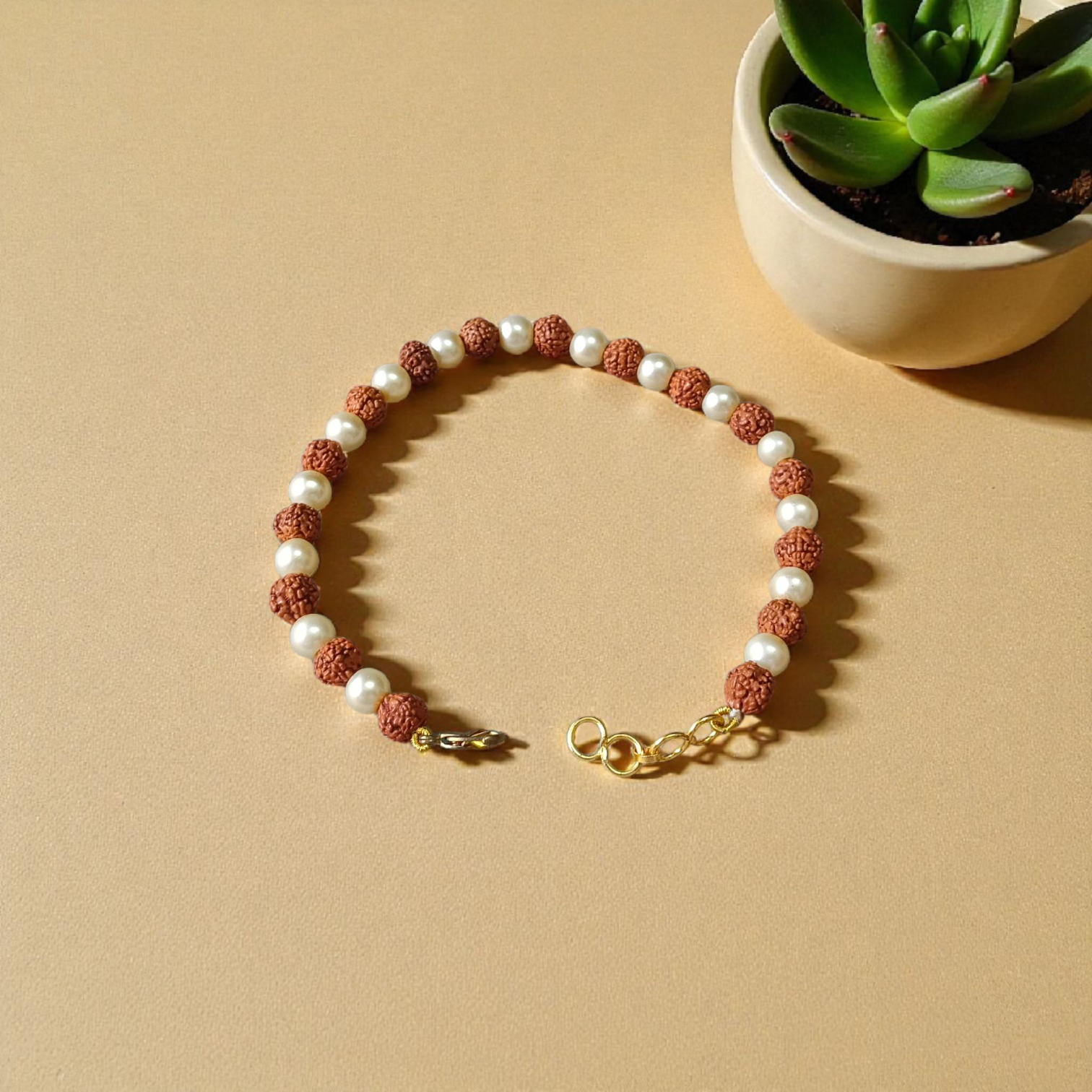 Handcrafted Rudraksha and Moti (Pearl) bracelet with stretchable design, lab certified, suitable for both men and women for daily and spiritual use