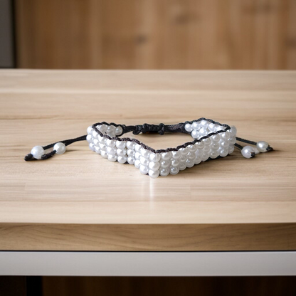 Handcrafted white pearl bracelet (motii) with elegant design suitable for daily wear and special occasions, made by Malawala 