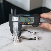 Handcrafted white pearl bracelet (motii) with elegant design suitable for daily wear and special occasions, made by Malawala 