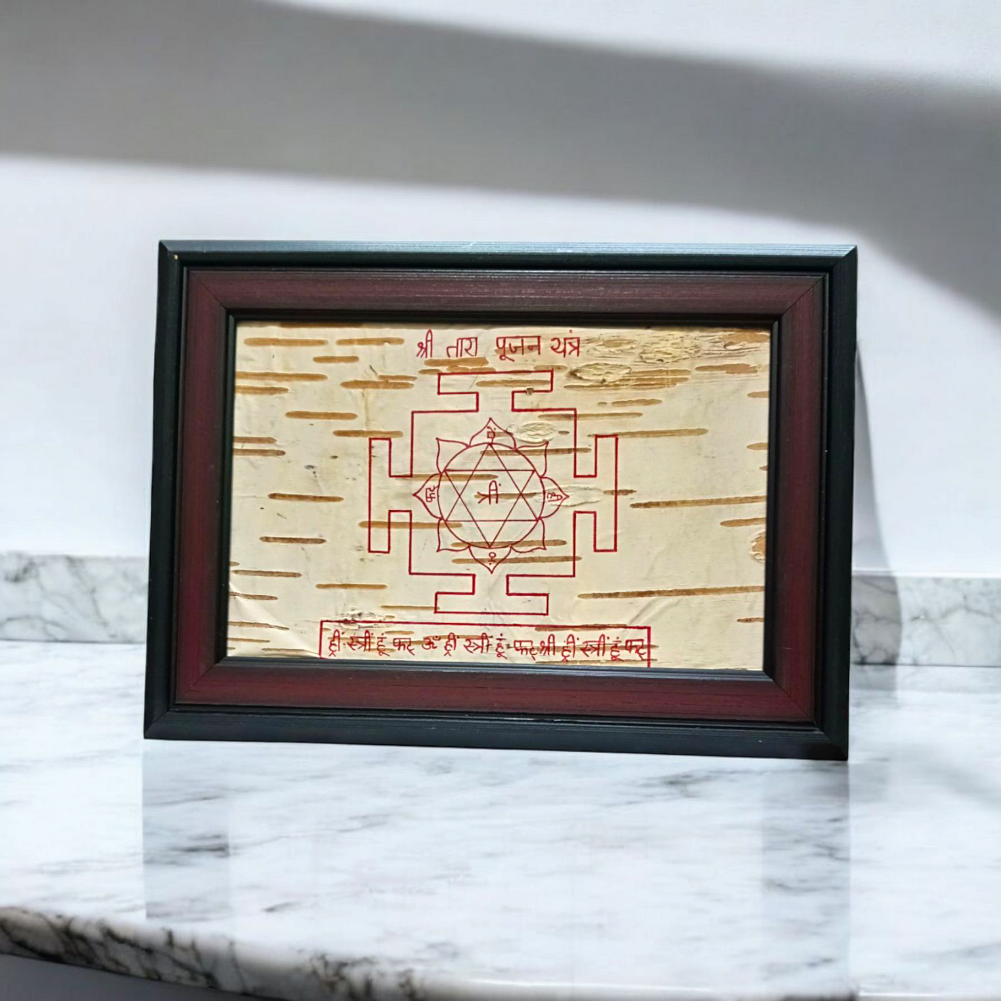 Handmade Shri Tara Pujan Yantra on Bhojpatra, used for worship and spiritual protection, ideal for overcoming life’s challenges