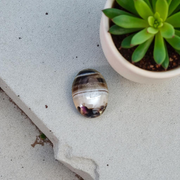 High-quality lab-certified Black Sulemani Hakik Stone with polished finish, used for protection and balance