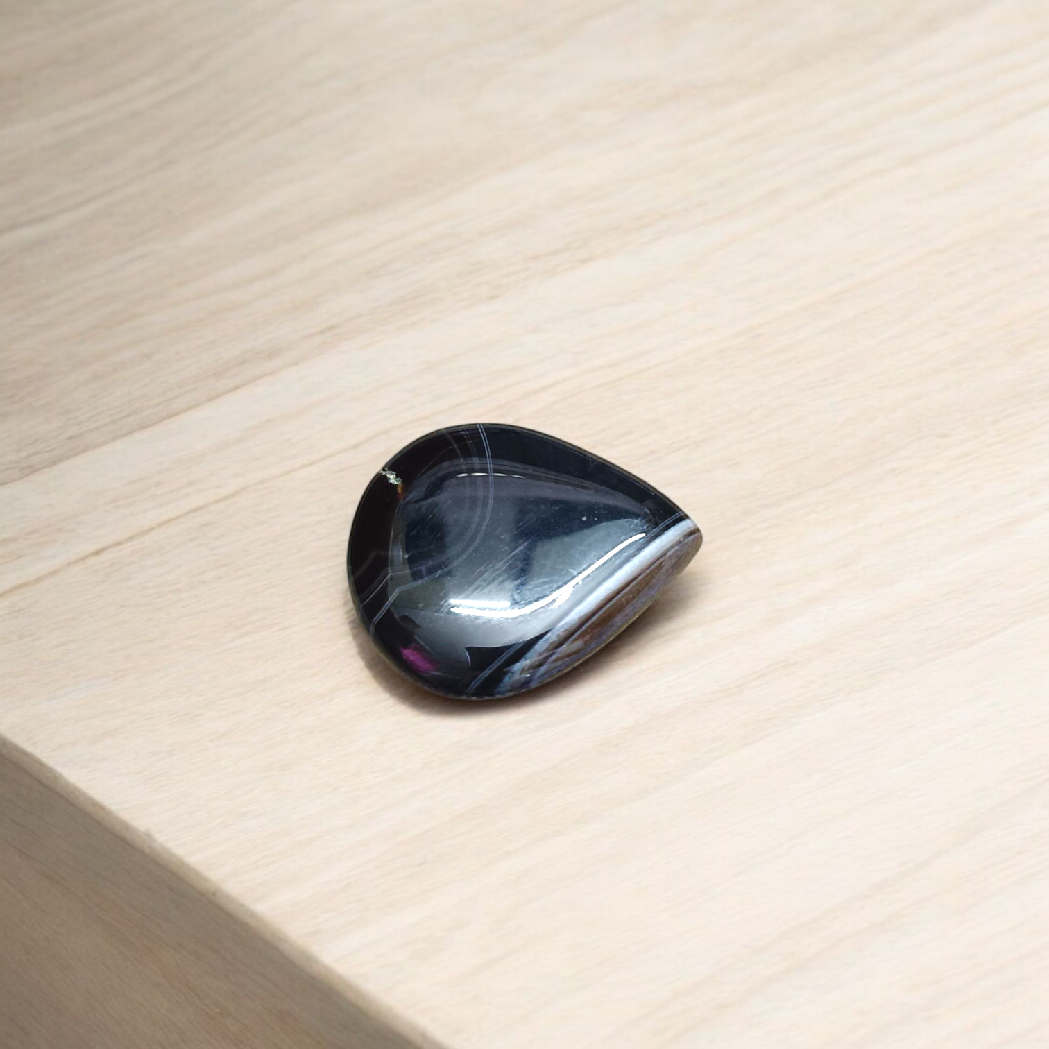 High-quality lab-certified Black Sulemani Hakik Stone with polished finish, used for protection and balance