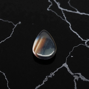 High-quality lab-certified Black Sulemani Hakik Stone with polished finish, used for protection and balance