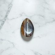 High-quality lab-certified Black Sulemani Hakik Stone with polished finish, used for protection and balance