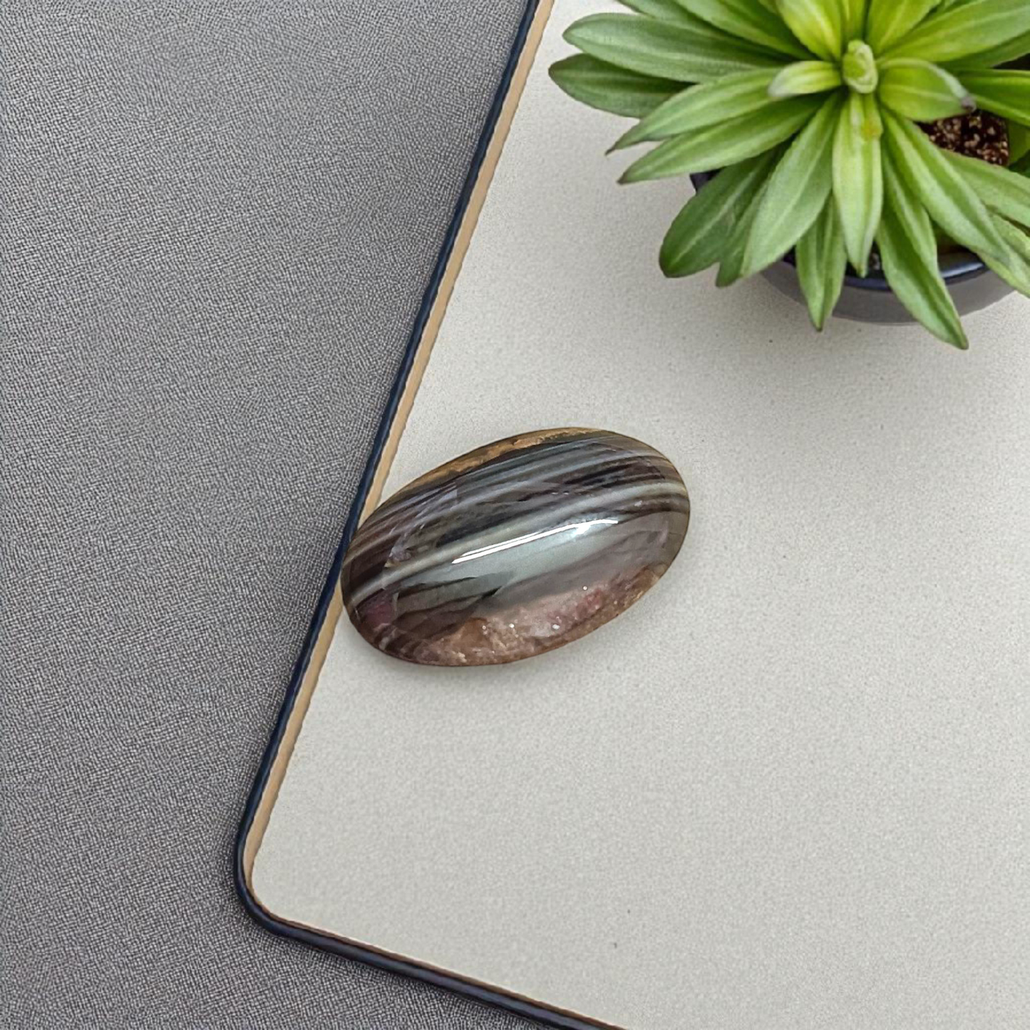 High-quality lab-certified Black Sulemani Hakik Stone with polished finish, used for protection and balance