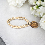 Image of Hanuman Ji Locket strung in Tulsi Mala with natural wood beads, placed on a white background