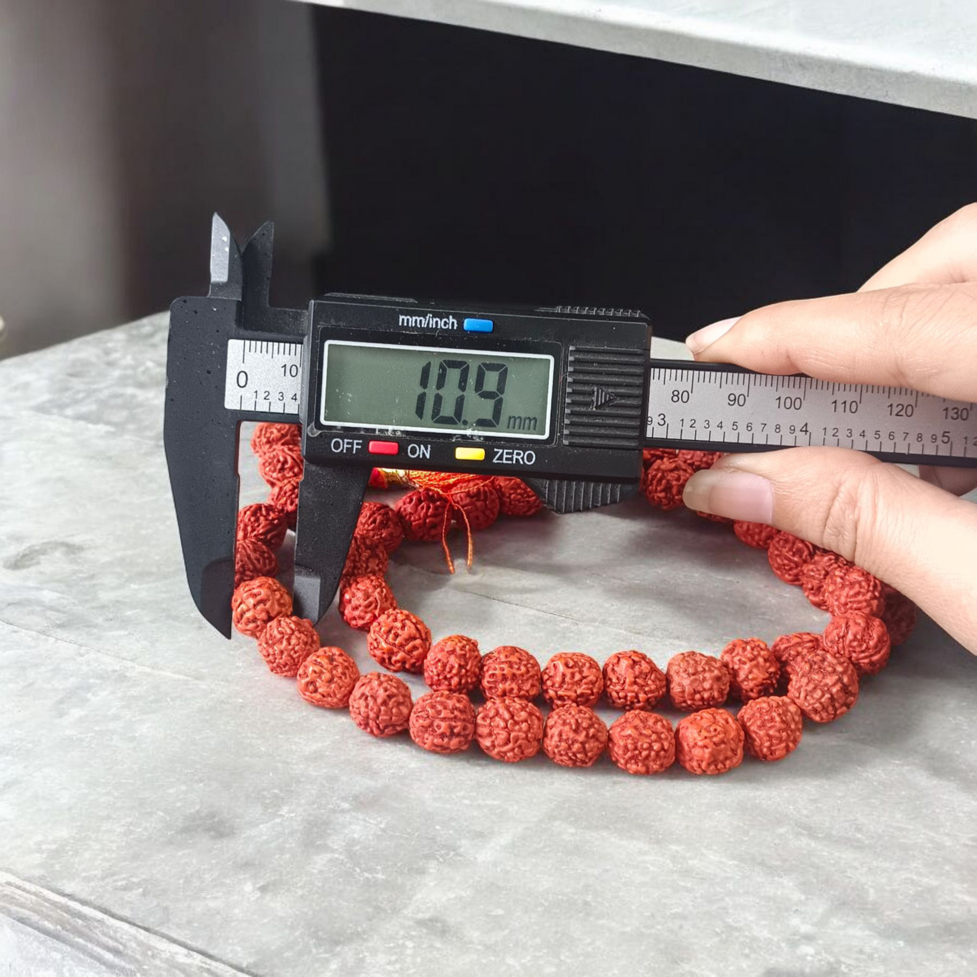 Image of Natural 5 Mukhi Rudraksha Jaap Mala with 54+1 large beads (10-11mm), hand-knotted on red thread, suitable for meditation and chanting