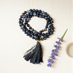 Image of Natural Sulemani Hakik (Black Agate) Mala with 108+1 and 27+1 polished 8mm round beads, displayed on a white background