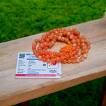 Image of Original Hessonite Garnet Mala with 8mm natural Gomed beads in 108+1 & 27+1 variants, hand-knotted and lab-certified for spiritual use