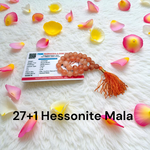 Image of Original Hessonite Garnet Mala with 8mm natural Gomed beads in 108+1 & 27+1 variants, hand-knotted and lab-certified for spiritual use
