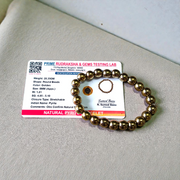 Image of a combo bracelet featuring 8mm golden Pyrite beads and glossy black Obsidian beads arranged side by side on a neutral background