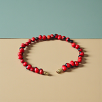 Image of a combo featuring two bracelets made of black and red Gunja seeds, arranged side by side on a clean white background