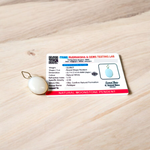 Image of a polished oval Natural Milky Moonstone Pendant on a black adjustable cotton thread, displayed on a neutral background
