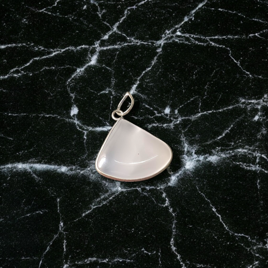 Image of a polished oval Natural Milky Moonstone Pendant on a black adjustable cotton thread, displayed on a neutral background