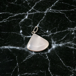 Image of a polished oval Natural Milky Moonstone Pendant on a black adjustable cotton thread, displayed on a neutral background