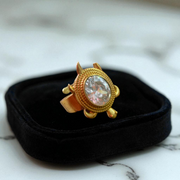 Image of adjustable Kachua Diamond Ring in Ashtdhatu by MALAWALA featuring a tortoise design with embedded diamond, suitable for men and women