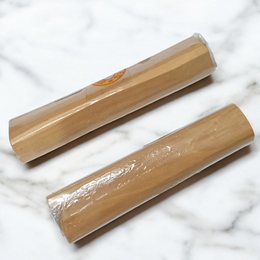 Image of original Mysore sandalwood stick for puja, weighing 30-40 grams, with a rich natural wood texture and soothing aroma