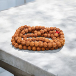 Image showing 6 Mukhi Rudraksha Mala with 13MM natural brown beads and traditional stringing, available in 27+1 and 108+1 variants, ideal for meditation and success