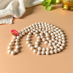 Image showing a combo of Tulsi Mala and Sphatik Mala with traditional guru beads, neatly arranged on a spiritual cloth background