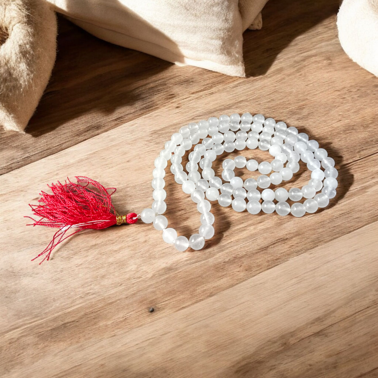 Image showing a set of 4 Jaap Malas – Rudraksha, White Sandalwood, Sphatik, and Red Sandalwood – neatly arranged on a traditional spiritual cloth