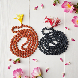 Image showing combo of brown Rudraksha Mala and Black Rudraksha Mala, each with 108+1 beads (8mm), lab certified and arranged on a spiritual cloth background